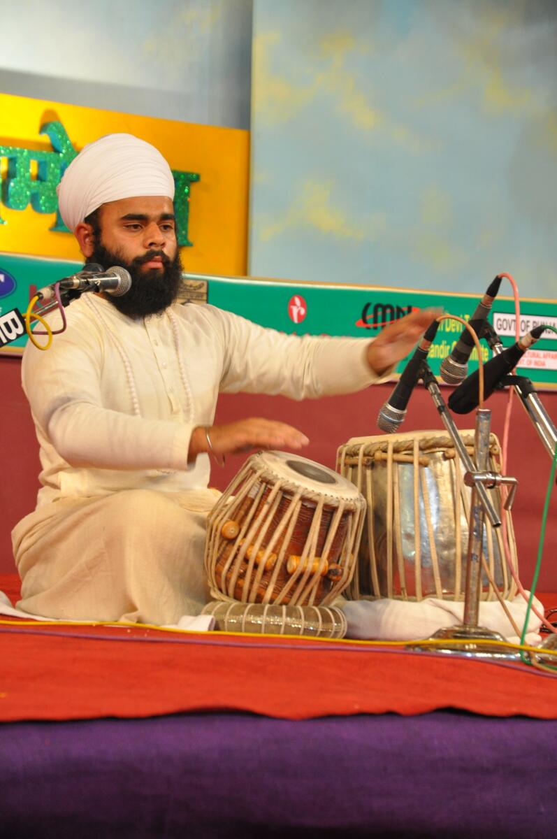 Rare sikh Instrument Jori representative Gian Singh Namdhari in harivallabh sangeet sammelan in 2011.